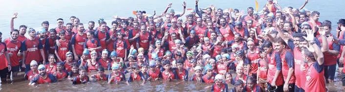 ഓളങ്ങളിൽ പുതുചരിത്രം; വേമ്പനാട്ടുകായൽ നീന്തിക്കടന്ന് 184 പേർ